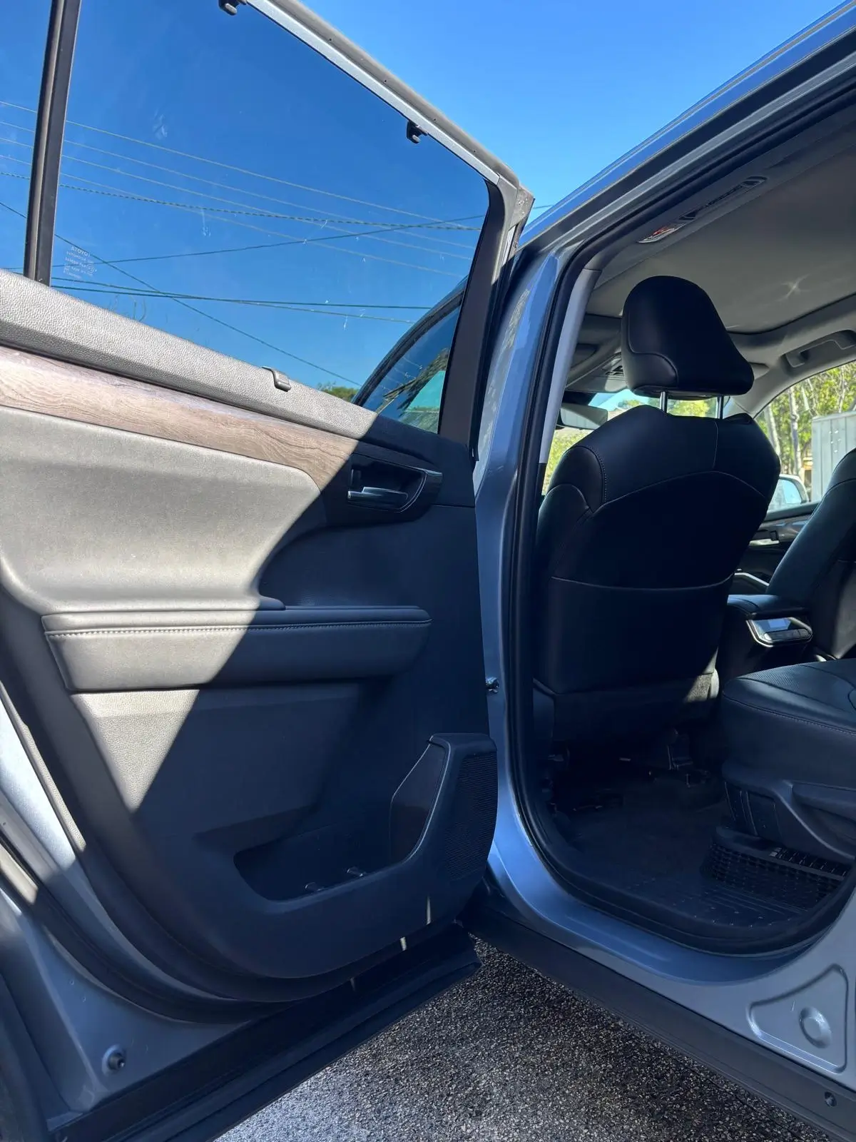 Immaculate luxury car interior detailing showing clean leather and dash